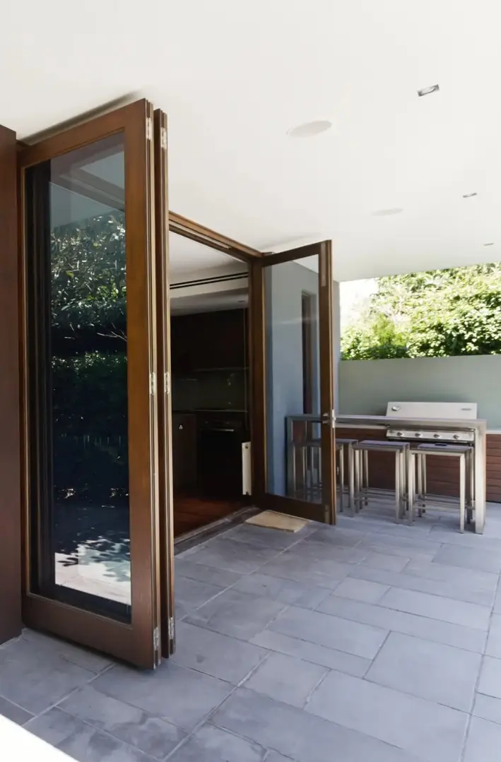 Bifold door system opening to an exterior terrace