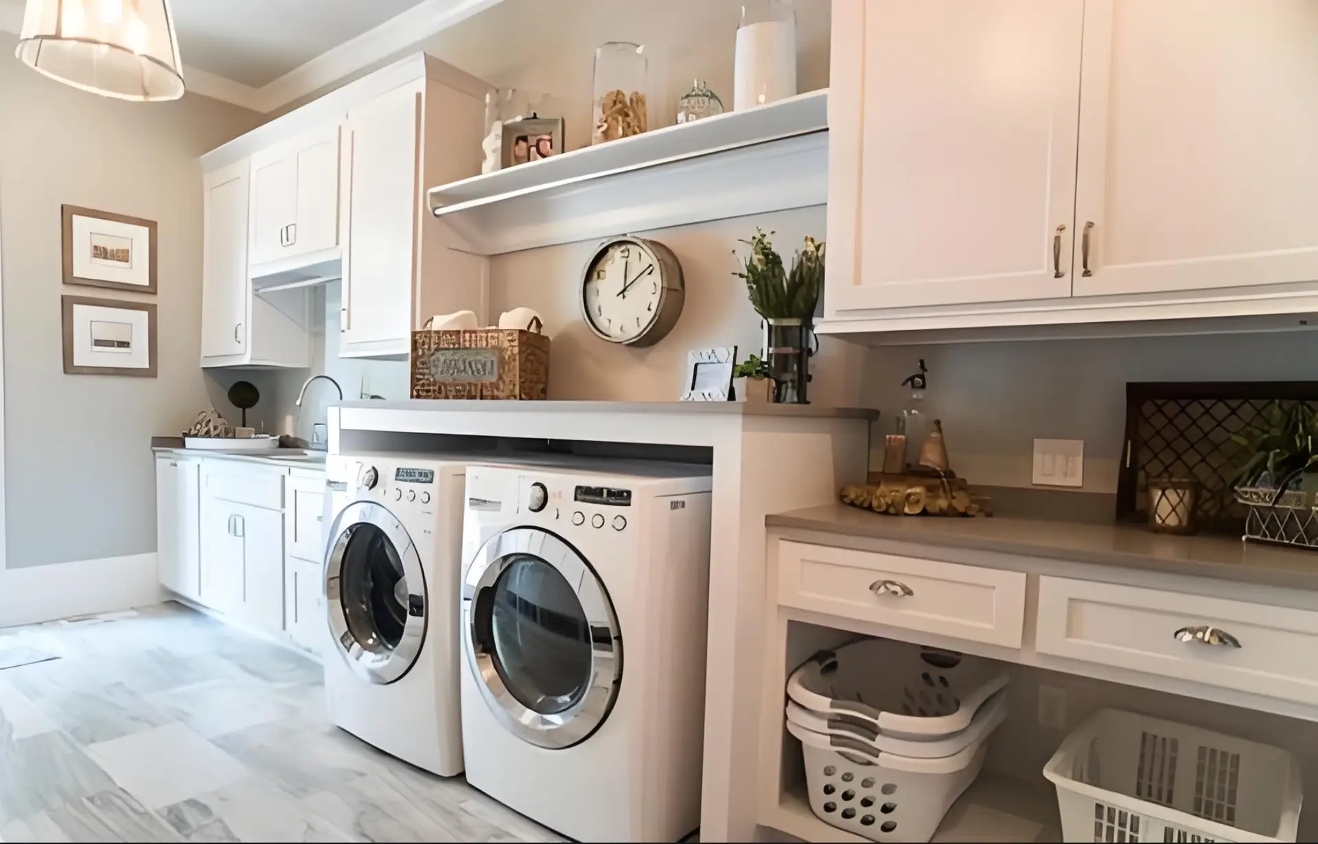 Custom laundry cabinets with side-by-side appliances, worktop and coordinated storage