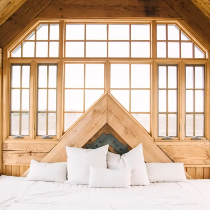 Top-hung awning window configuration in a residential room