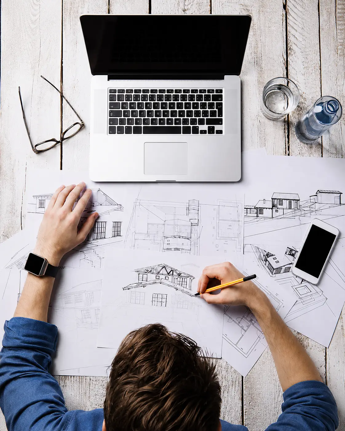 Architect reviewing material samples and shop drawings