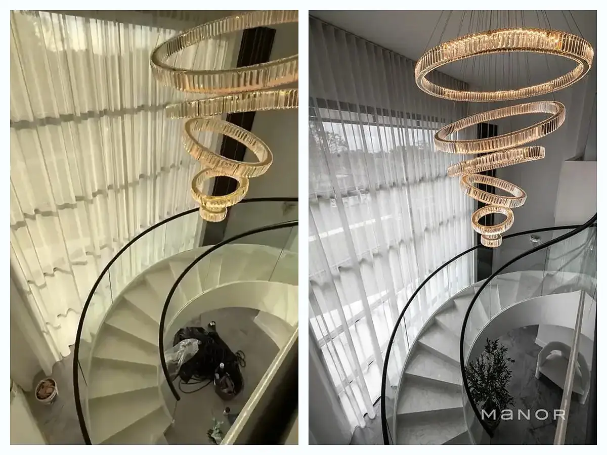 Spiral staircase and pendant lighting details in a Melbourne villa